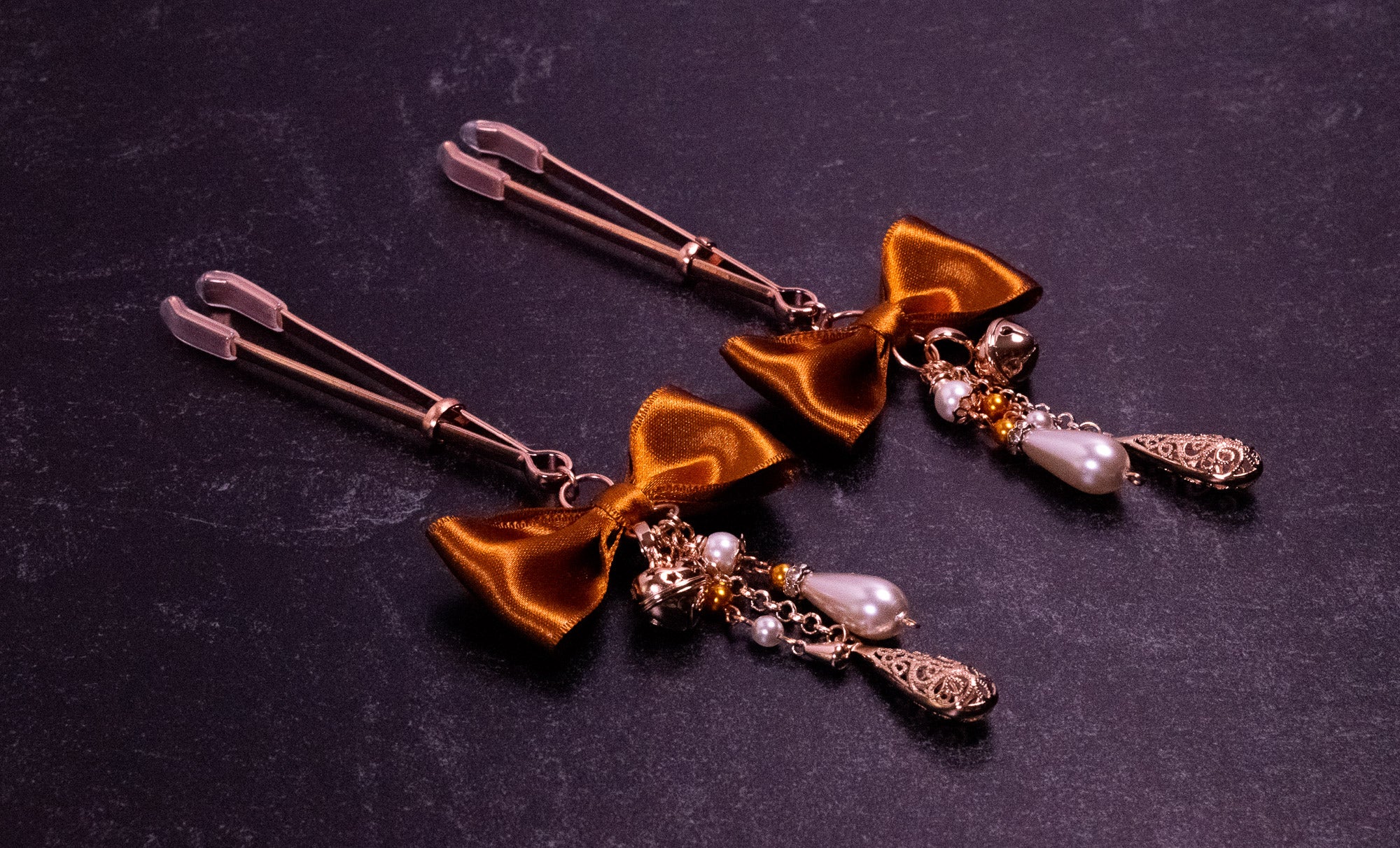 Deluxe Caramel Bow Tweezer Nipple Clamps in Rose Gold