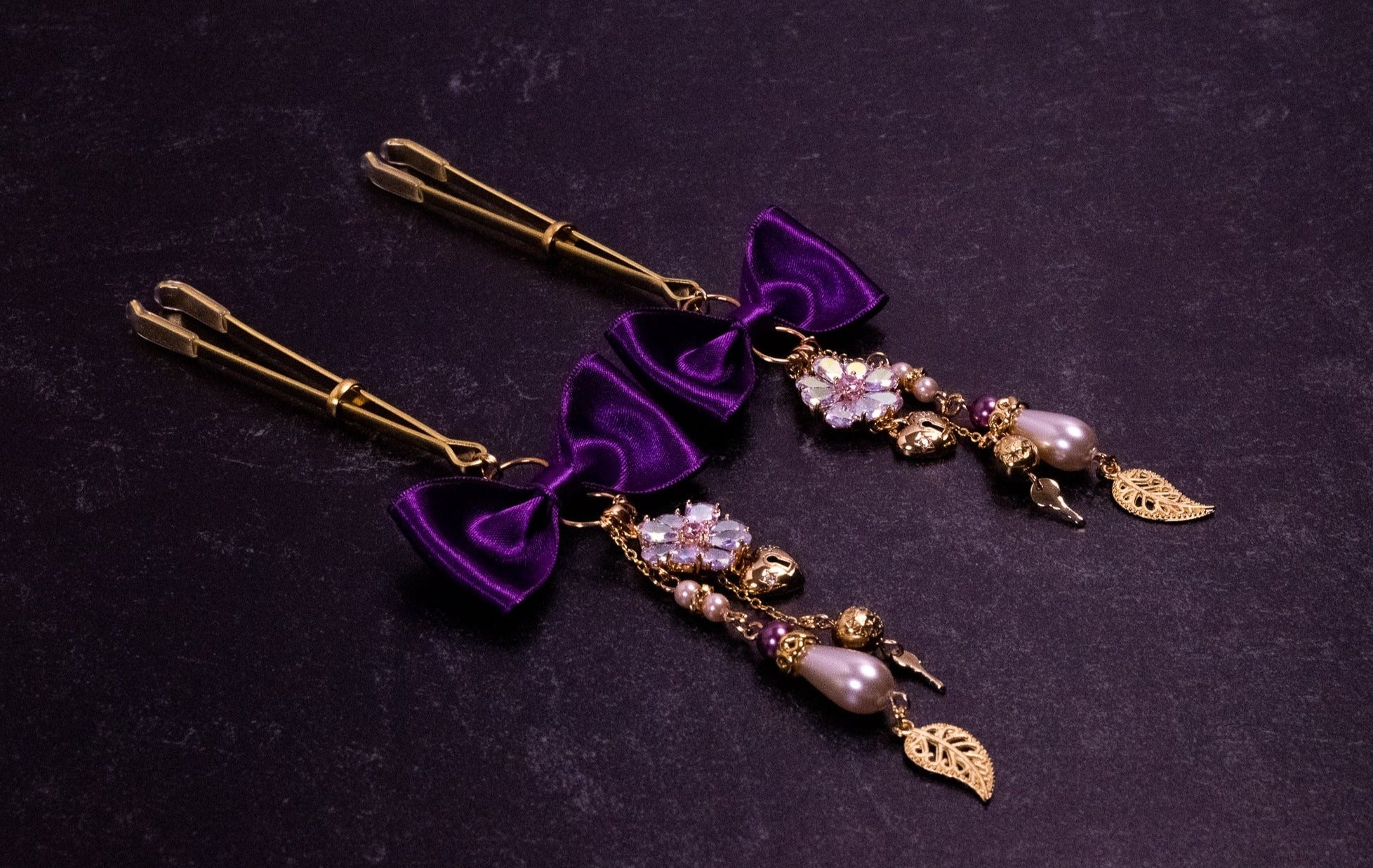 Deluxe Imperial Purple Bow Tweezer Nipple Clamps in Gold